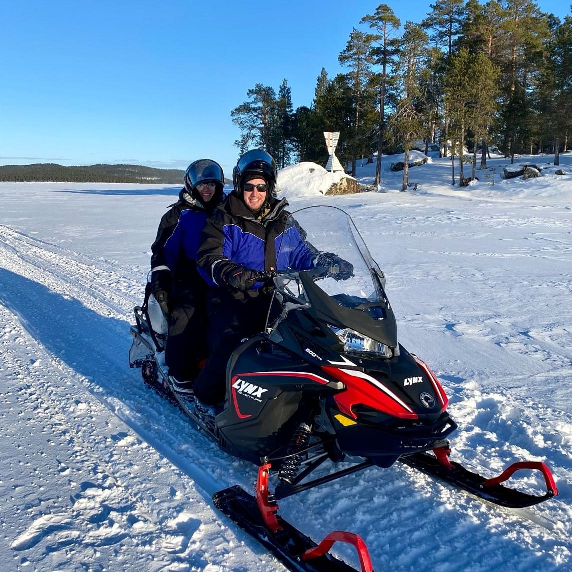 Snowmobile Tour along Ivalo River & Lake Inari with Reindeer Experience & Lunch from Ivalo Safaris.