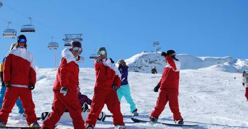 Kids Snowboarding Lessons (7-15 y.) for Beginners from Skischule Ski Dome Oberschneider Kaprun A group of instructors ready to teach Kids Snowboarding Lessons (7-15 y.) for Beginners with Ski Dome Oberschneider in Kaprun.