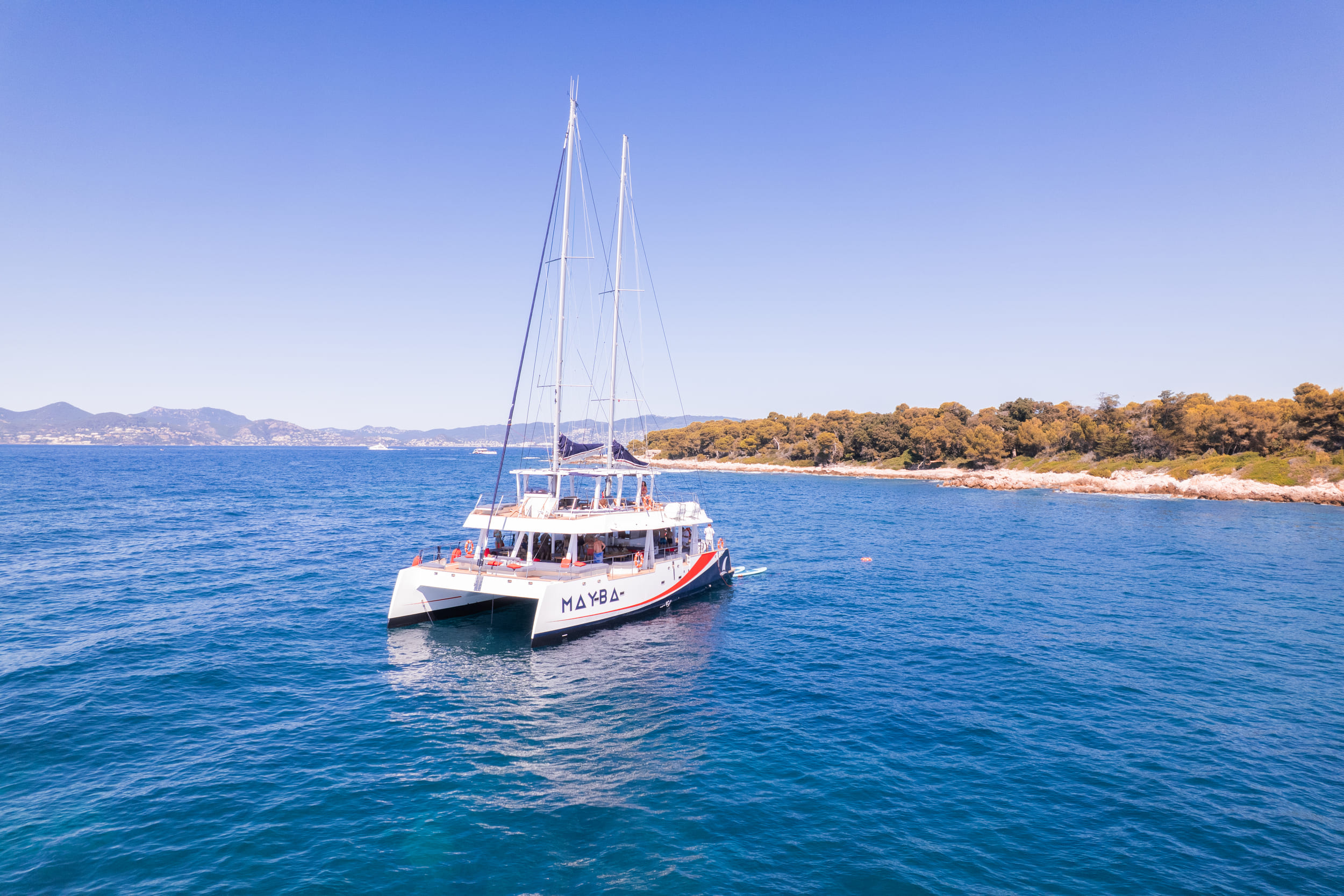 Full-Day Catamaran Trip to Lérins Islands & Cap d'Antibes with Lunch & SUP from AMC Cape Grace Côte d'Azur.