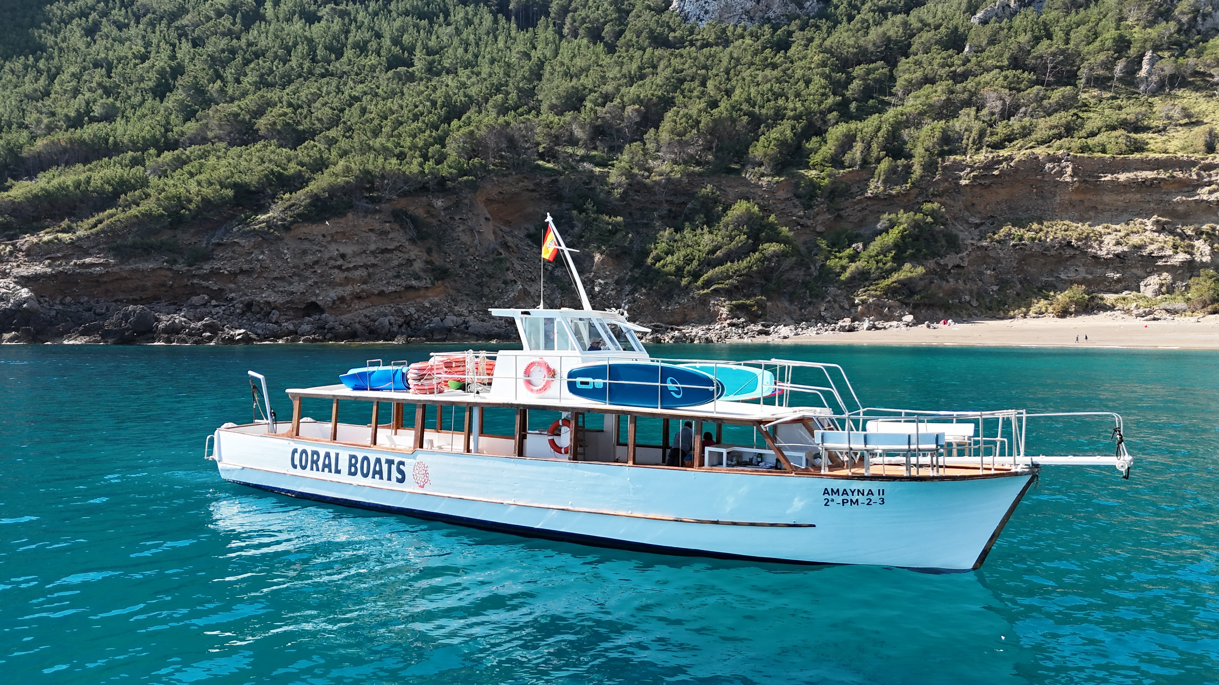 Morning Boat Trip in Alcúdia Bay with Tapas, Drink & Swimming Stop from Coral Boats Mallorca.