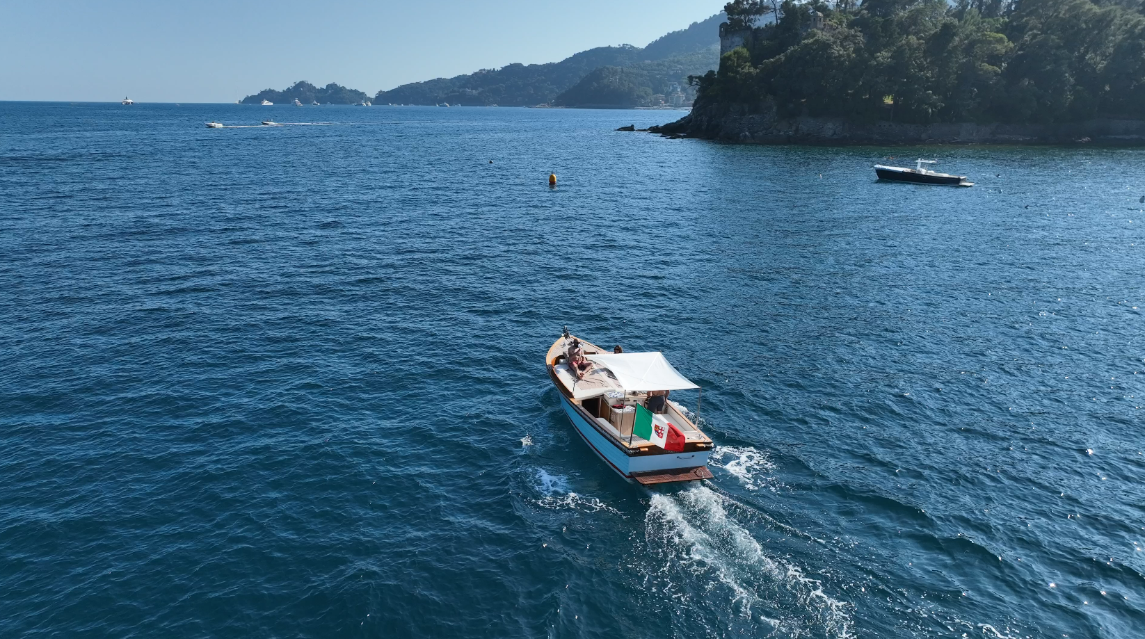 Private Sunset Boat Trip in Portofino with Apéritif & Swimming Stops