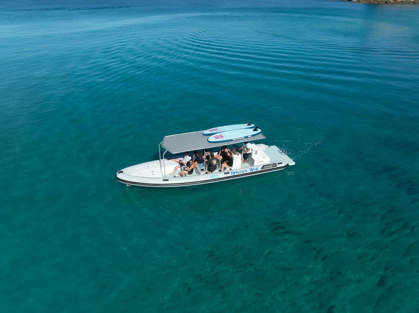 Speedboat Trip from Port d'Addaia to the Northen Coves with Snorkeling & SUP from Menorca Nord Sea Experience.