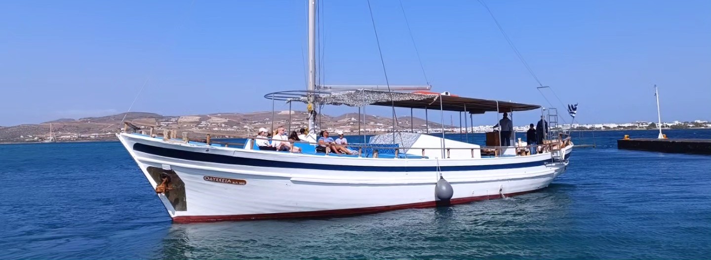 Traditional Wooden Boat Trip to the Blue Lagoon & Epitaphios Cave with Greek Lunch.