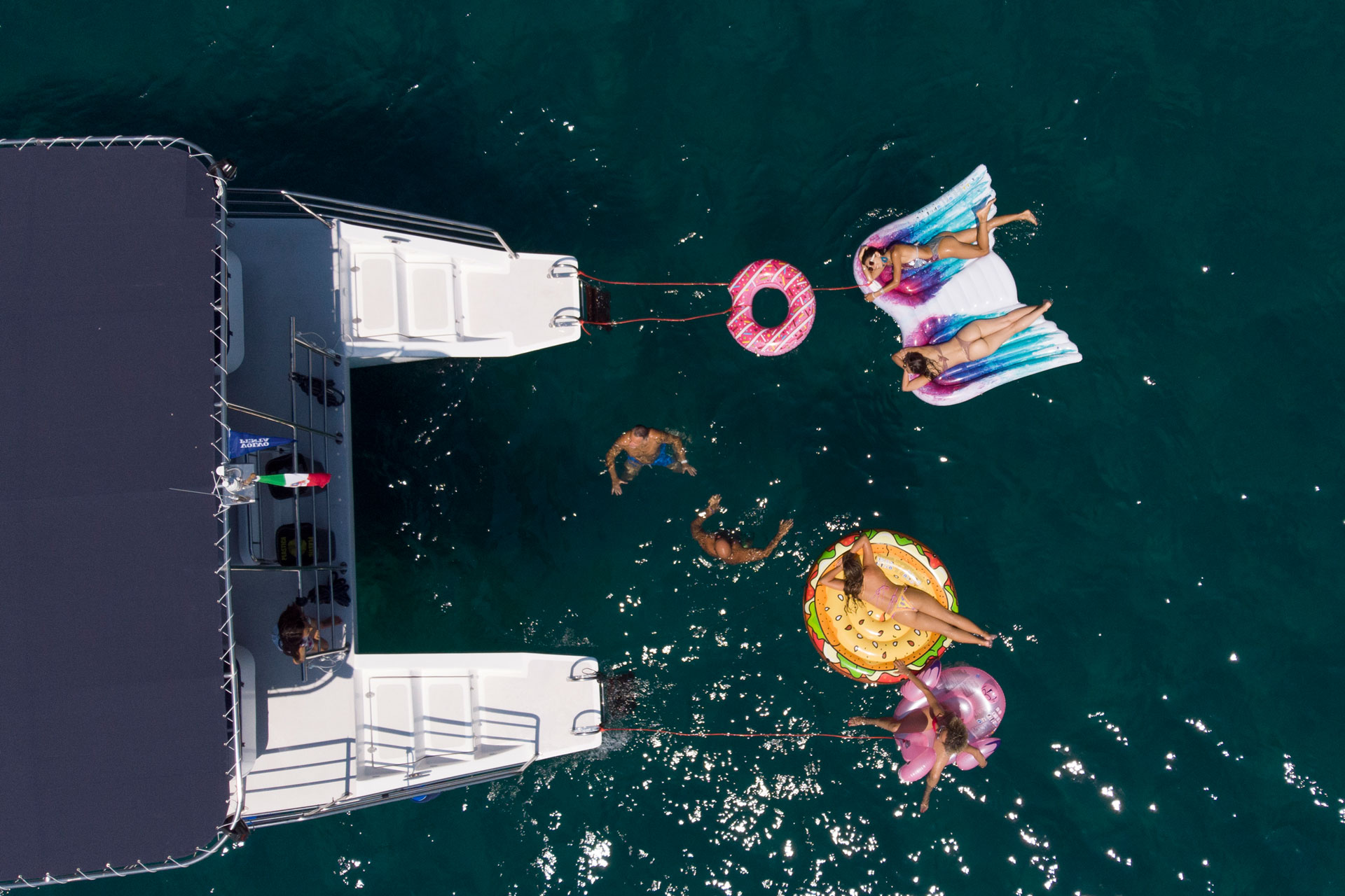 Private Catamaran Trip along Ulysses Riviera with Lunch, SUP & Snorkeling.