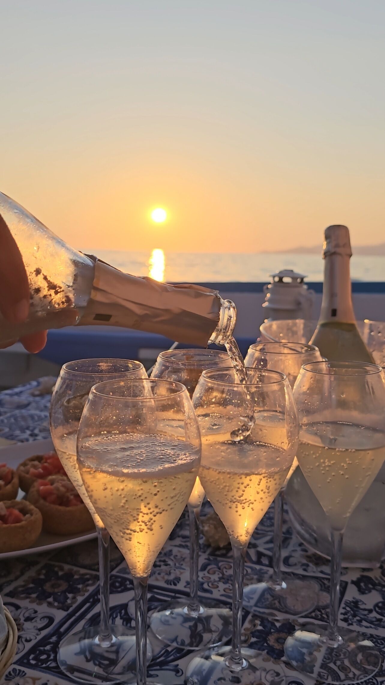 Sunset Boat Trip along the Coast of Capo Palinuro with Swimming Stops & Apéritif from Cilento Coast Company Palinuro.