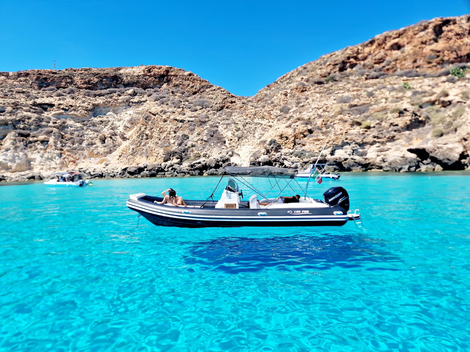 RIB Boat Trip around Lampedusa with Snorkeling & Swimming Stops.