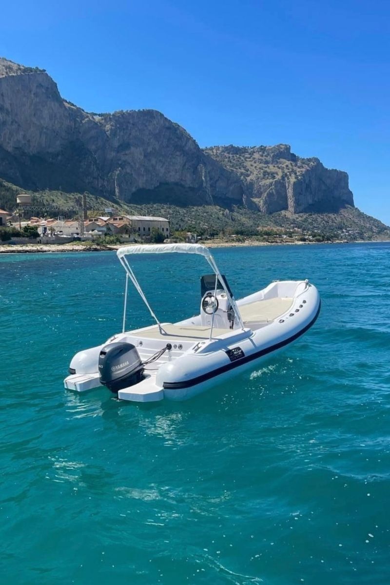 Boat Trip from Catania to Aci Trezza and Aci Castello with Apéritif & SUP from Atlantic Experience Catania.
