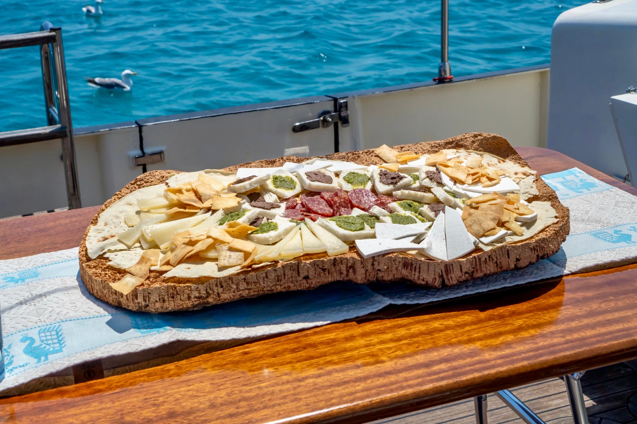 Private Boat Trip to Tavolara, Molara & Figarolo with Sardinian Lunch & SUP.