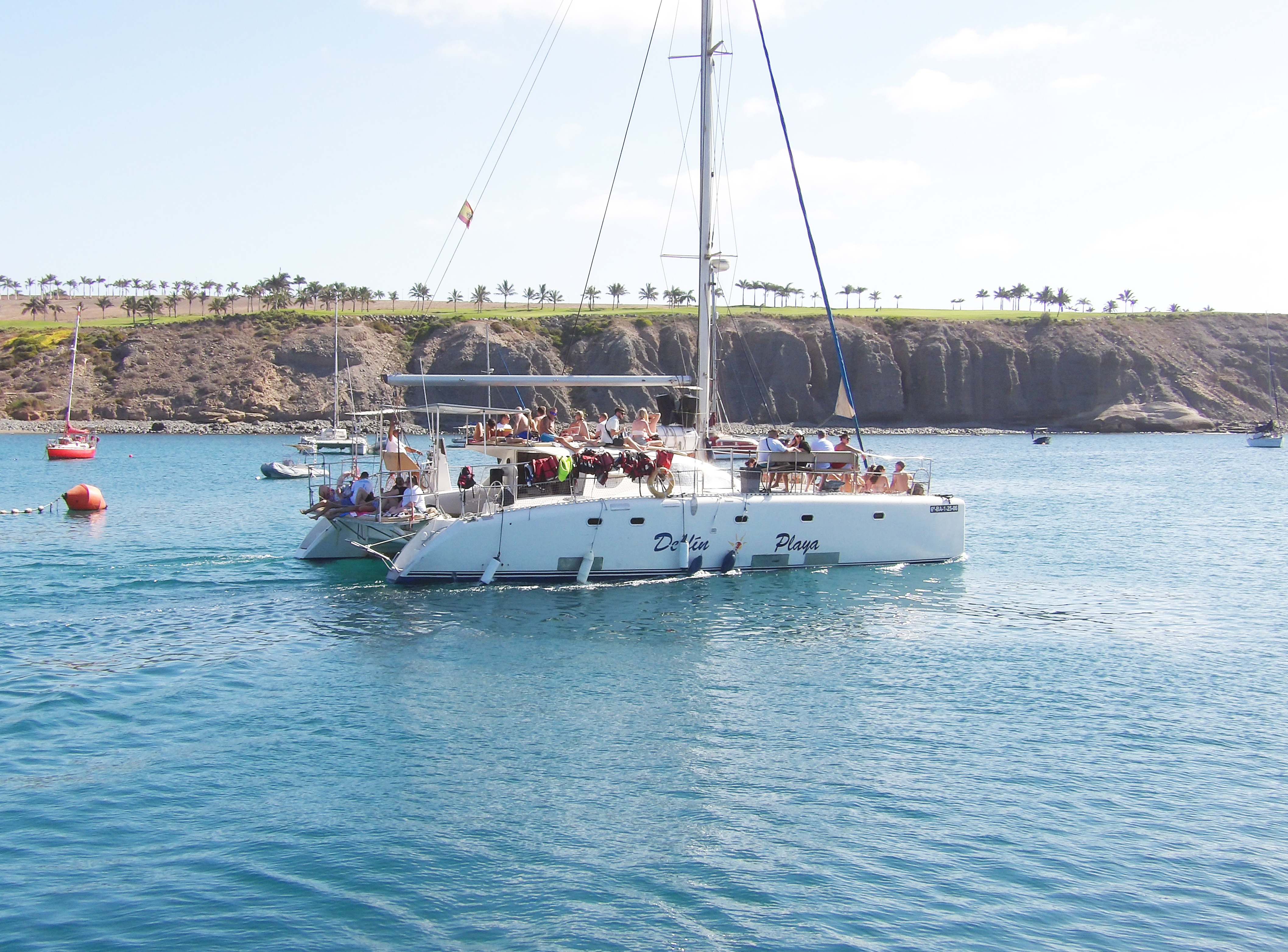 Catamaran Trip from Pasito Blanco with Dolphin Watching, Swimming & Banana Boat.