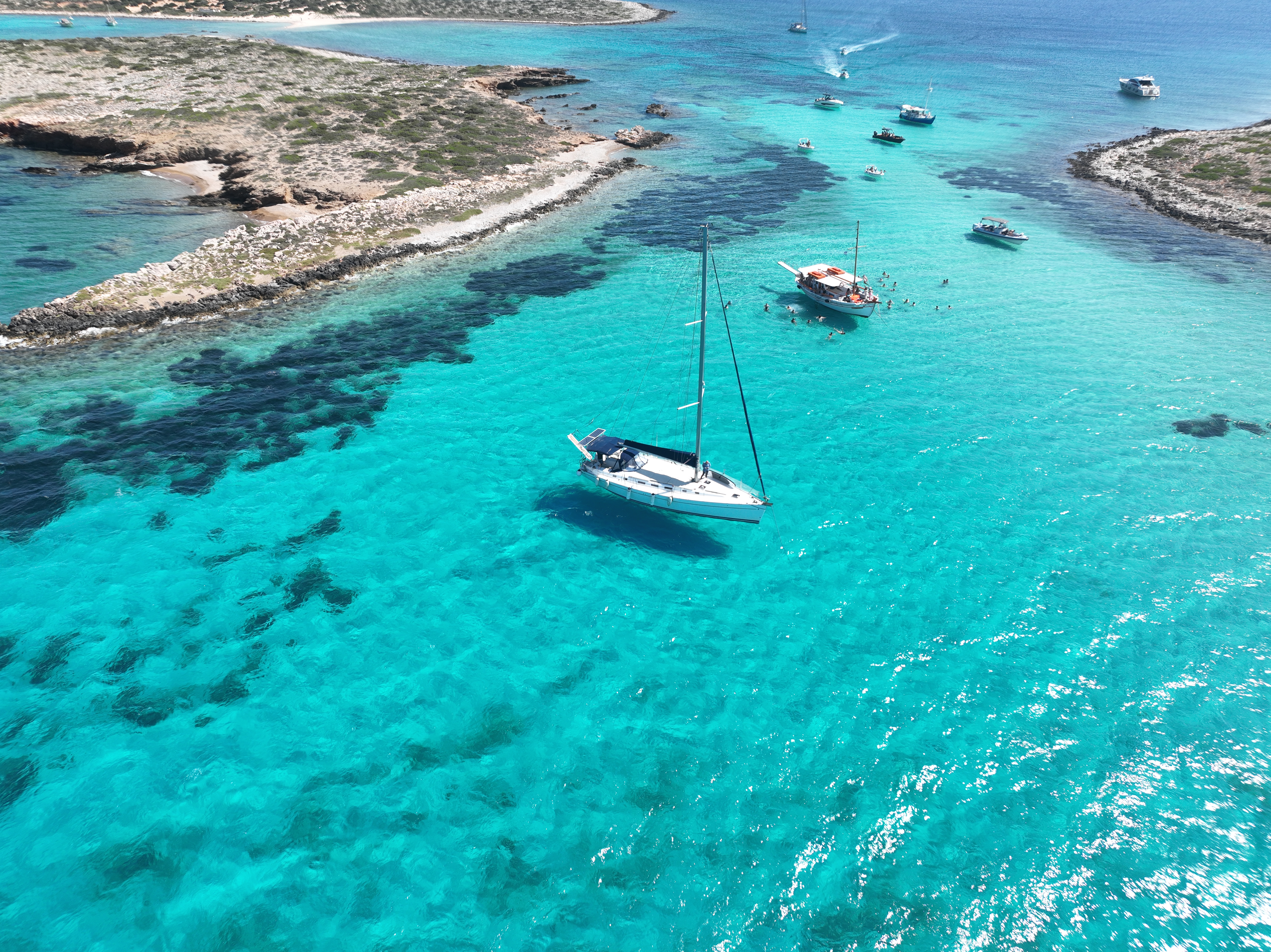 Private Sailing Trip from Paros to Antiparos with Food, Snorkeling & SUP.