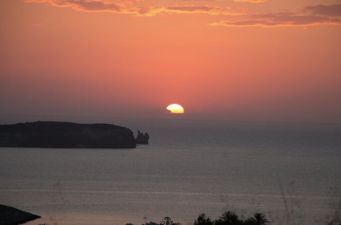 Sunset Sailboat Trip to the Fira Channel with Apéritif & Swimming Stops.
