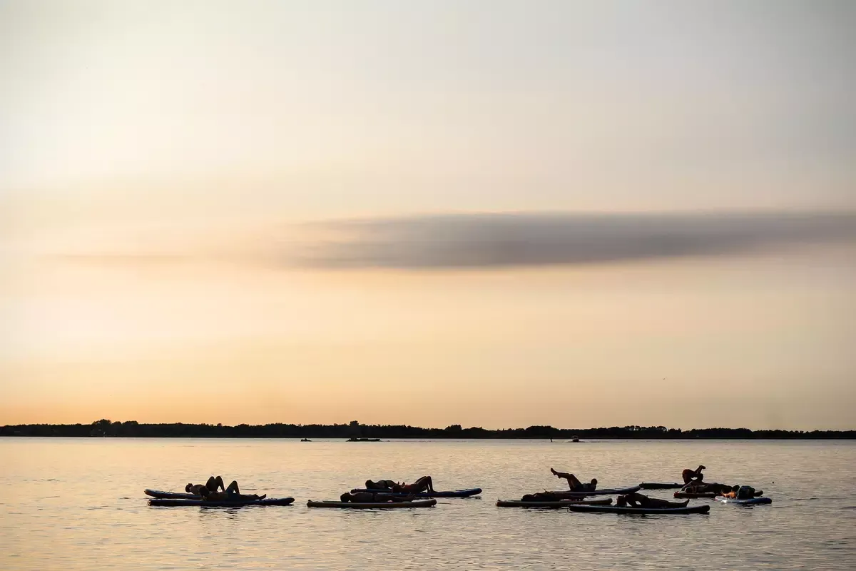 Sunrise SUP Yoga Class in Saint-Florent from Perla Nera Saint-Florent.