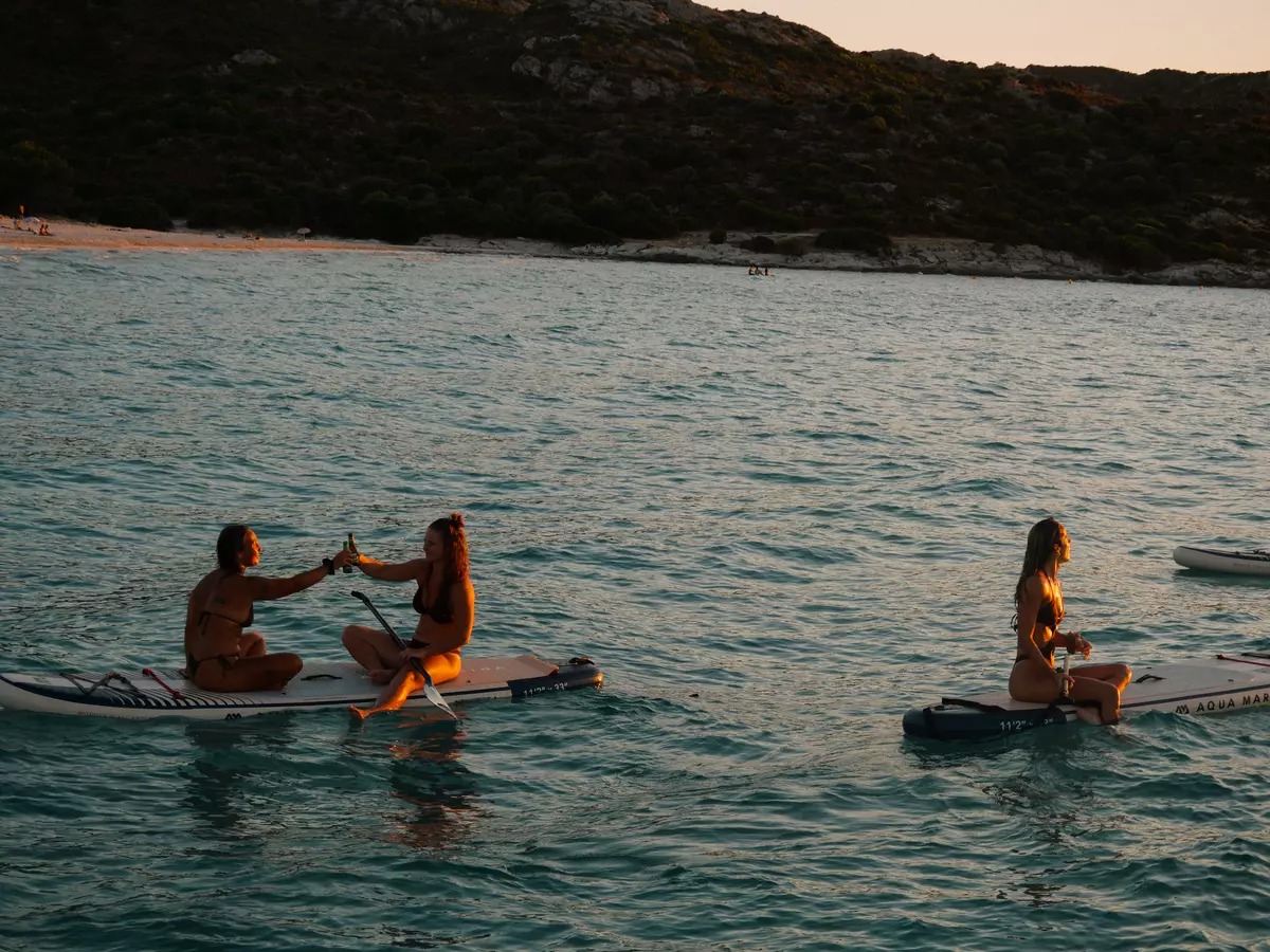 Sunset Guided SUP Tour in the Gulf of Saint-Florent with Swimming & Apéritif.