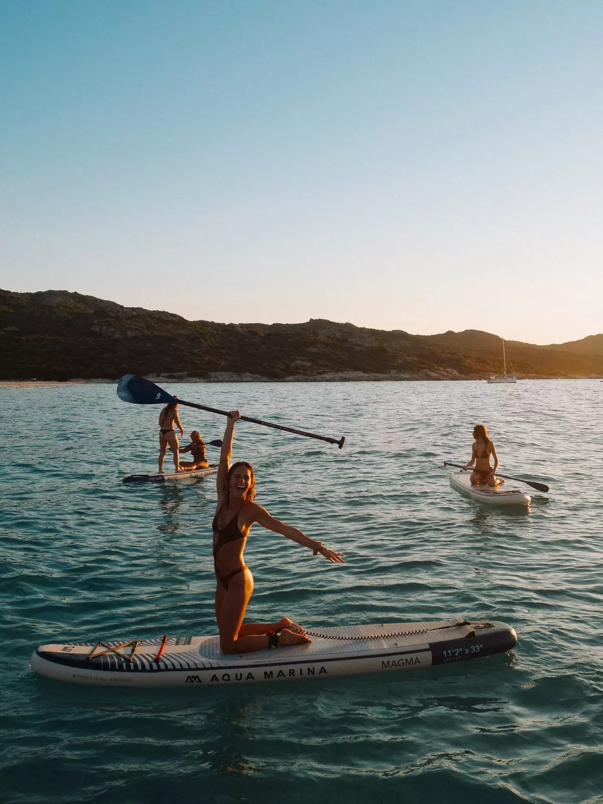 Sunset Guided SUP Tour in the Gulf of Saint-Florent with Swimming & Apéritif from Perla Nera Saint-Florent.