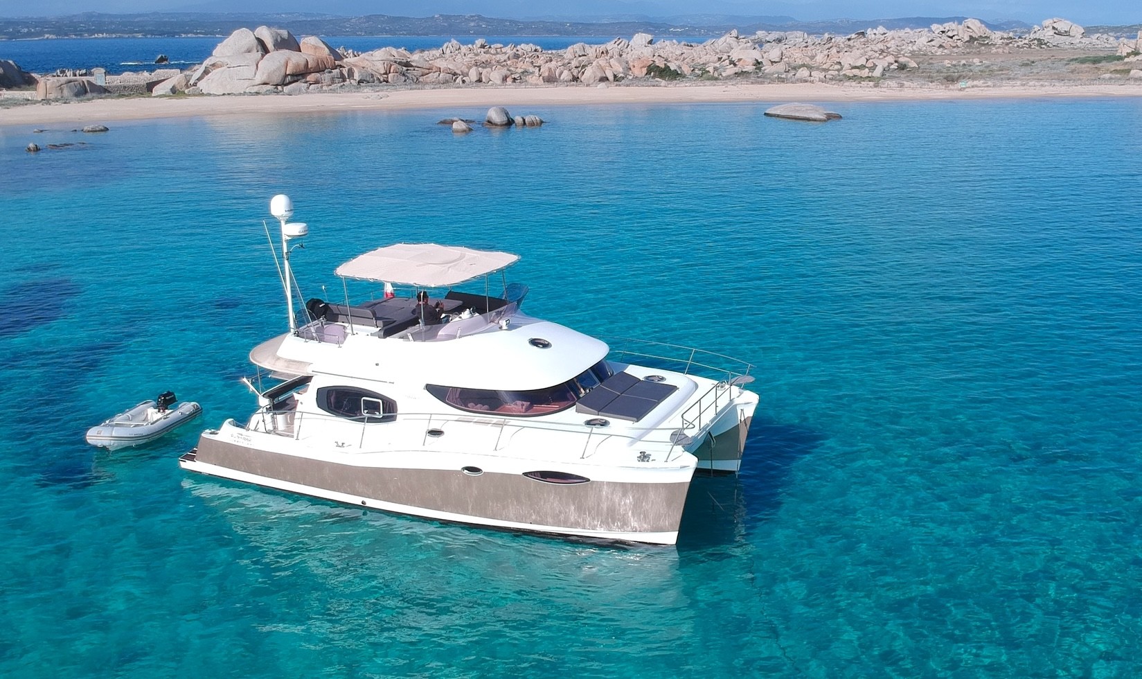 Private Catamaran Trip to Bouches de Bonifacio with Snorkeling & SUP from Bonifacio Catamaran.