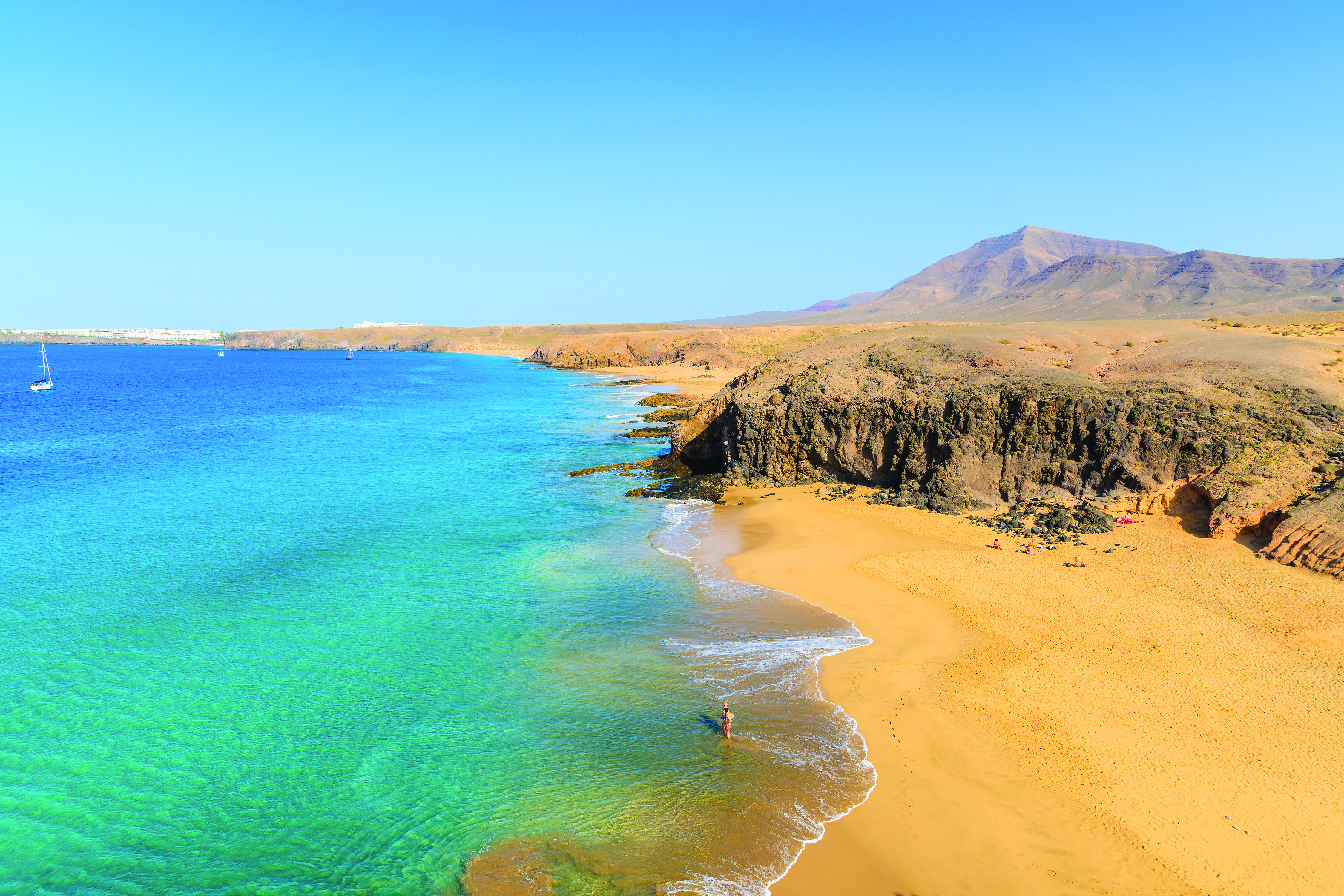 Catamaran Trip to Papagayo Beach in Lanzarote with Lunch, Open Bar & Pick-up from Lineas Romero.