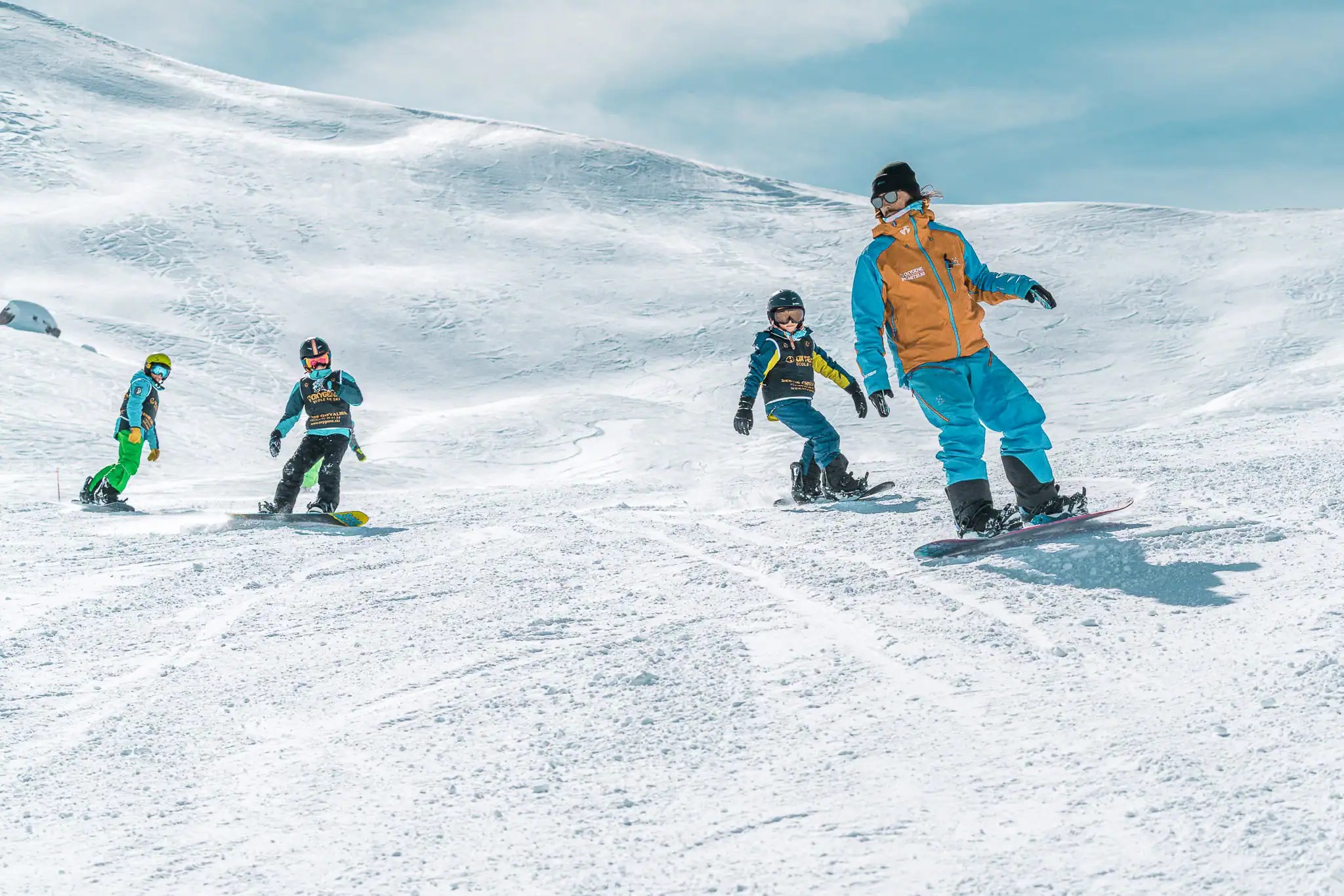 Cours de snowboard Enfants (dès 8 ans) et Adultes pour Tous niveaux avec École de ski Oxygène Belle Plagne.