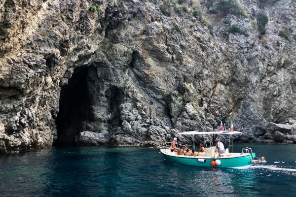 Boat Trip from Torre Faro to the Caves of Bagnara with Swimming Stops.
