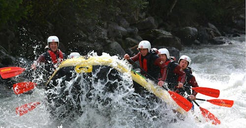 Extreme Rafting on the Ötztaler Ache from Haiming During Extreme Rafting on the Ötztaler Ache from Haiming with CanKick Ötztal, a group of young men is facing a grade V rapid on Ötztaler Ache.
