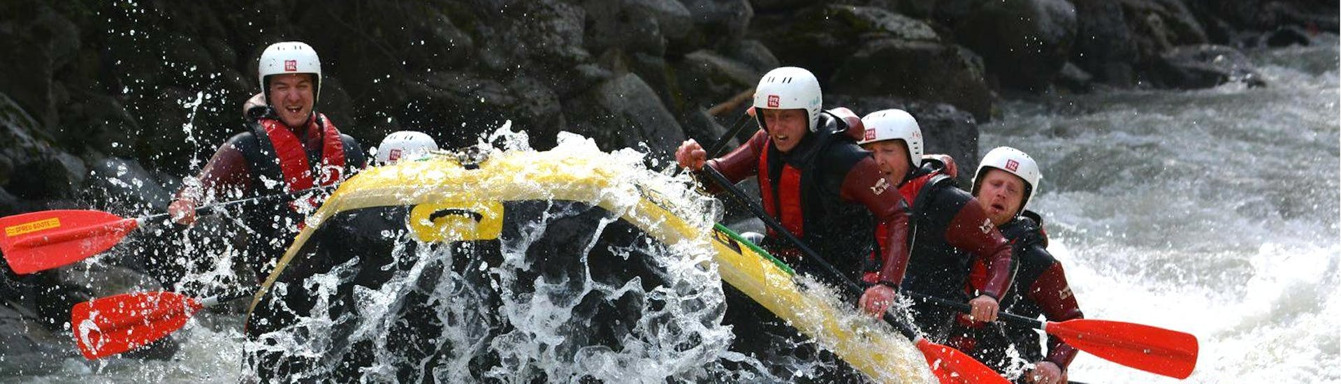 During Extreme Rafting on the Ötztaler Ache from Haiming with CanKick Ötztal, a group of young men is facing a grade V rapid on Ötztaler Ache.