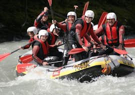Rafting Daytrip on the Inn River through Imster Schlucht from CanKick - Ötztal A group of friends is having fun on a Rafting Daytrip on the Inn River through Imster Schlucht with Cankick Ötztal.