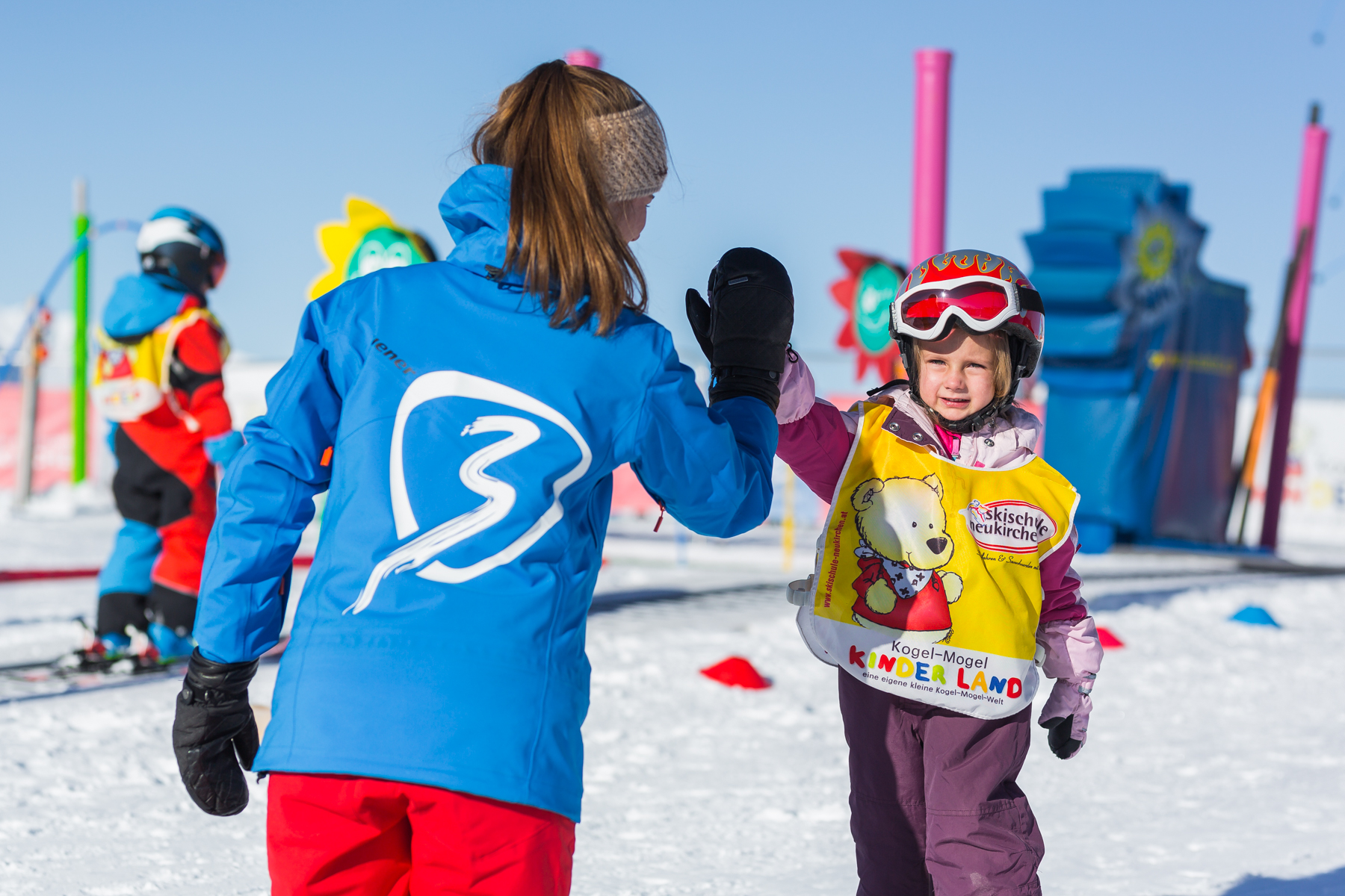 Skilessen voor kinderen (5-14 jaar) van alle niveaus - Halve dag met Ski School Neukirchen.