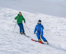 A ski instructor from the ski school Ski Cool Val Thorens is leading the way during Private Off-Piste Skiing Lessons for advanced skiers.