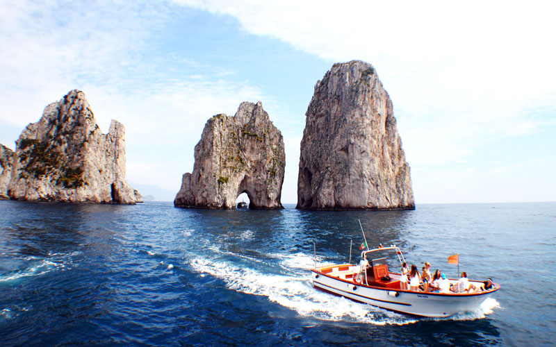 Boat Tour Around Capri with Stop at the Blue Grotto from Motoscafisti Capri.