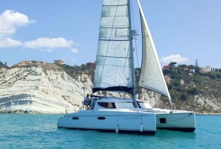 Catamaran Trip to Stair of the Turks with Snorkeling & Apéritif from Carmela Cinquemani.