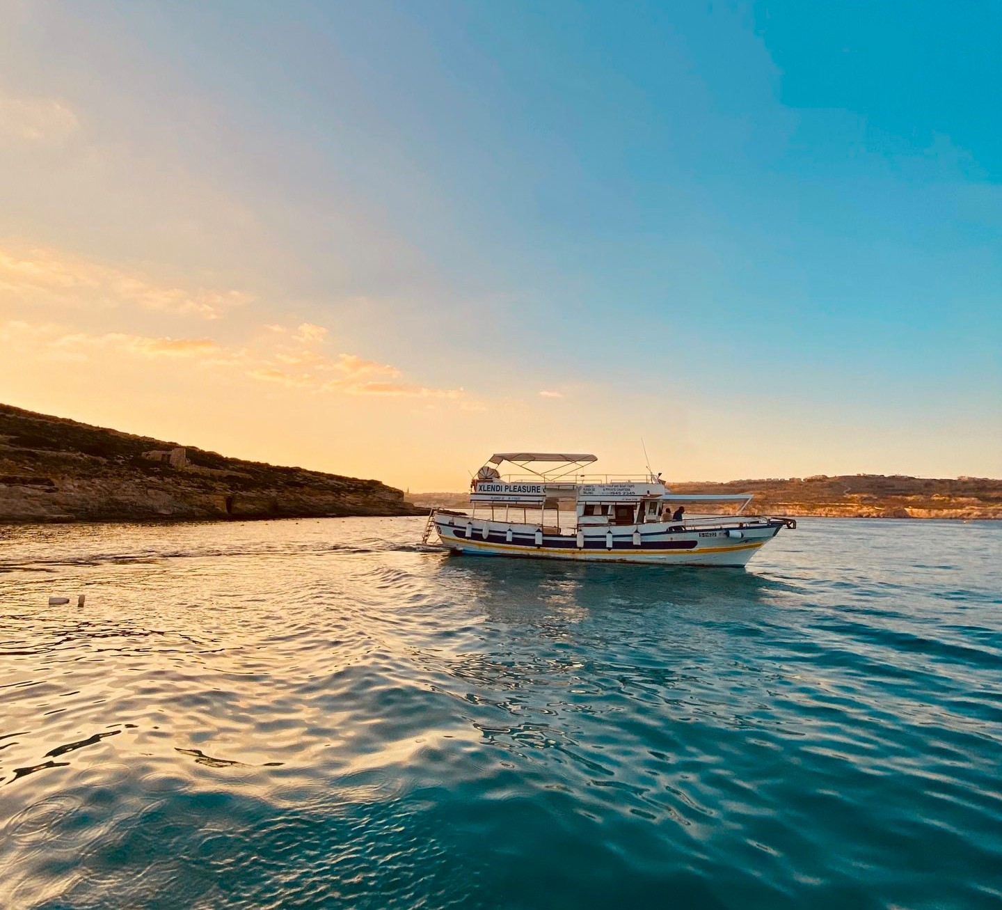 Sunset Boat Trip to the Blue & Comino Caves with Swimming from Malta.