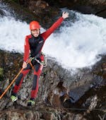 A man abseiling while Canyoning in Lower Auerklamm - Ultimo Tour with feelfree Outdoor Professionals Ötztal.
