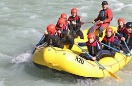 A boat of H2O Adventure Ried during Rafting for Families on the Inn River - Pirate Tour.