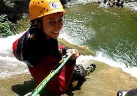 A woman abseiling during Fun Canyoning in Starzlachklamm from Sonthofen with Die Canyonauten Allgäu