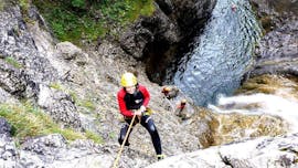 A costumer asbeiling during the Advanced Canyoning in Allgäu - Day Tour with Die Canyonauten Allgäu
