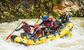 People in a rafting boat while Power Rafting on the Saalach River in Lofer - Classic 3 Tour with Motion Outdoor Center Lofer.