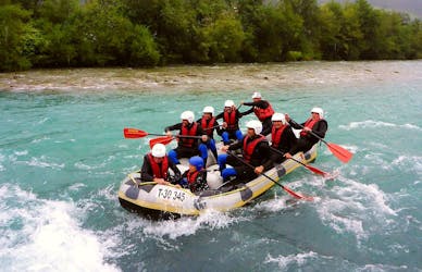 A group of rafters is paddling along the river during their Rafting for Adventurers on the Ziller with Freiluftakademie.