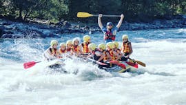 People in a boat while Rafting on the Isel River - Sports Tour with Adventurepark Osttirol.