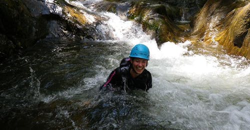 Canyoning in East Tyrol - First Step Tour from Adventurepark Osttirol A woman having fun while Canyoning in East Tyrol - First Step Tour with Adventurepark Osttirol.