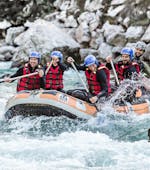 The participants of the Actionrafting with "Minirafts" - Saalach offered by Base Camp, are paddling through a rapid on Saalach river near Lofer.
