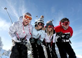 Adult ski group smiling to the camera