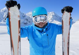 A skier smiling in the camera during his Private Ski Lessons for Adults of All Levels from Erste Skischule Bolsterlang.