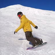 Cours particulier de snowboard (dès 7 ans) pour Tous niveaux & âges avec Ralf Hartmann.