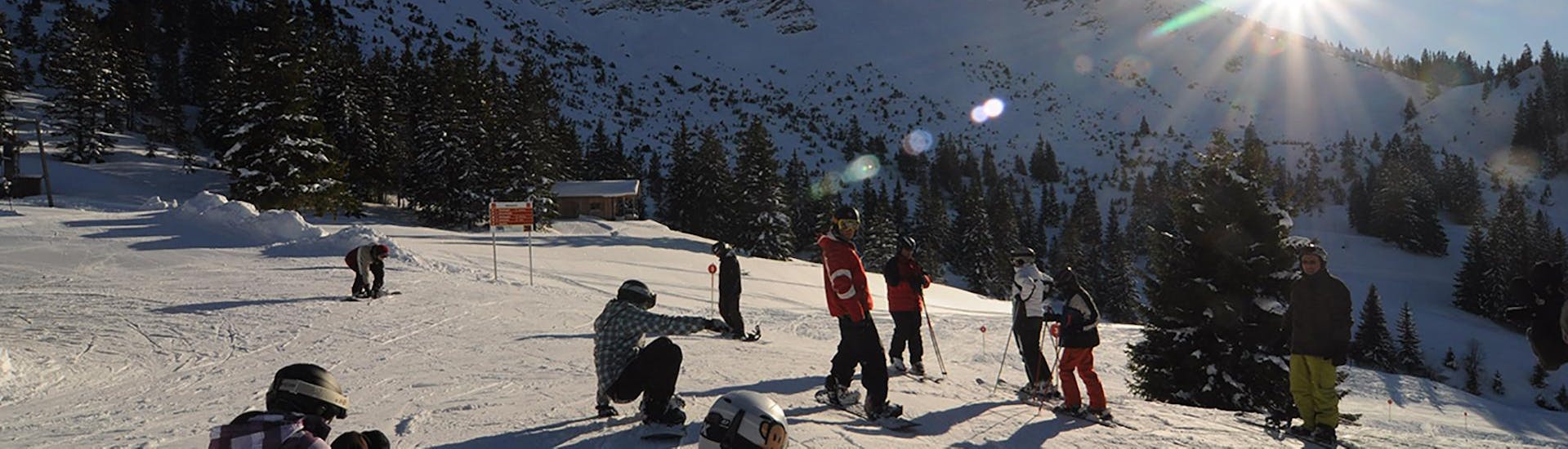 Kids Snowboarding Lessons (7-12 y.) for All Levels with Ski &amp; Snowboard School Ostrachtal - Hero image