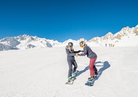 Lezioni di Snowboard a partire da 8 anni per tutti i livelli con École de ski Evolution 2 Tignes.