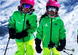 Siblings are learning to ski durin Private Ski Lessons for Kids of All Ages with the ski school Prosneige Val Thorens & Les Menuires.