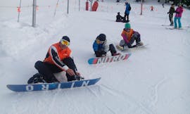 Snowboardkurs für Kinder (6-15 J.) - Max 5 - Montana mit Swiss Mountain Sports Crans-Montana.