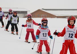 Kids Ski Lessons “Kids Club” (4-16 y.) for Beginners with Ski School Ski Total Kirchdorf