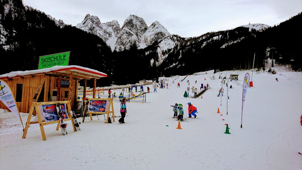 Zwisiland during kids ski lessons for beginners with ski school Dachstein West in Gosau.
