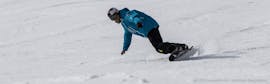 Snowboardlessen voor kinderen (7-14 jaar) voor alle niveaus met Skischule Fieberbrunn Widmann Mountain Sports.