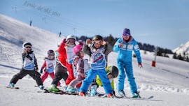 A group of young skiers enjoy the slopes of Les Gets during a kids ski lesson with 360 Les Gets.